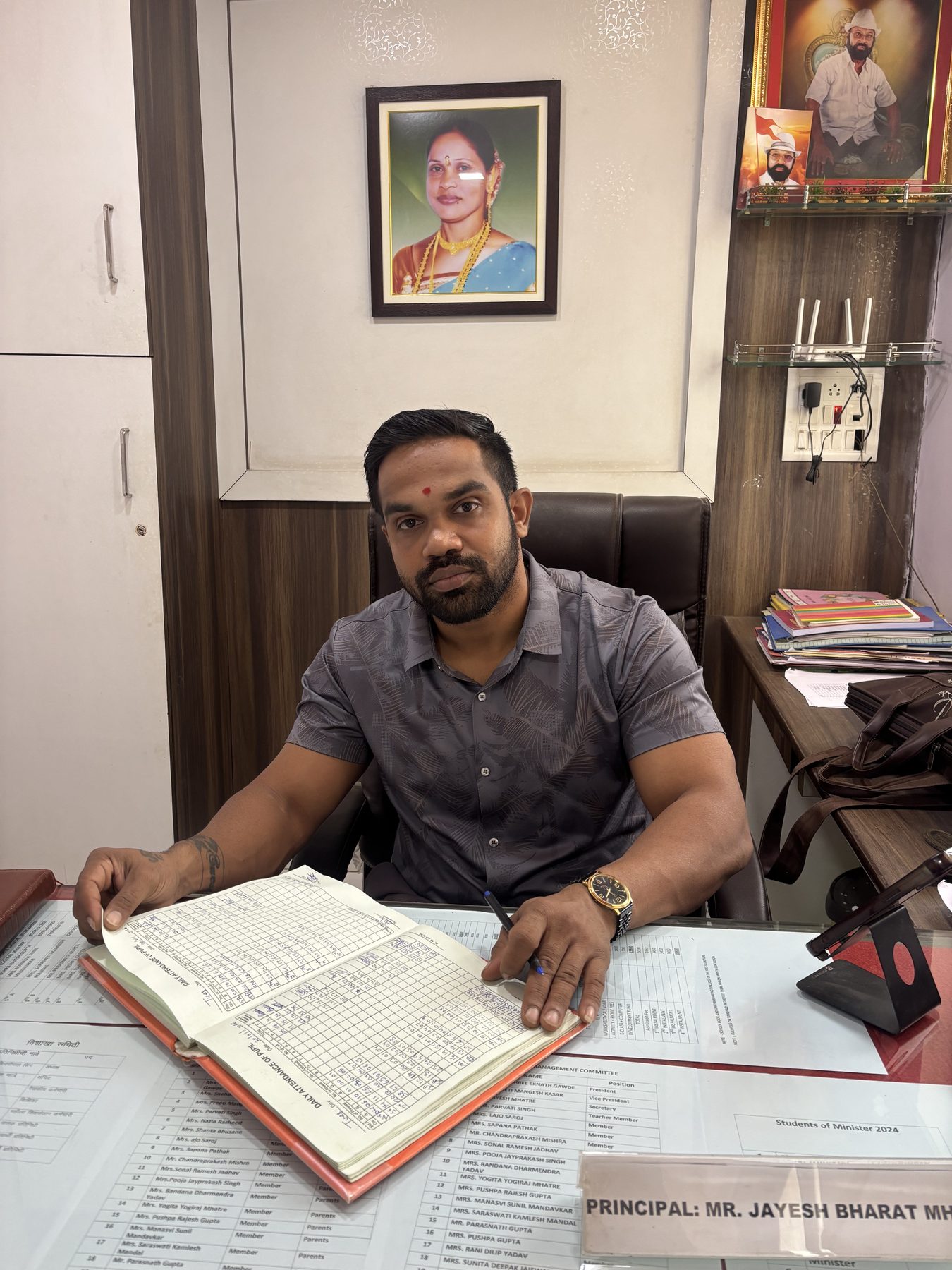 Principal Mr. Jayesh Bharat Mhatre at his office